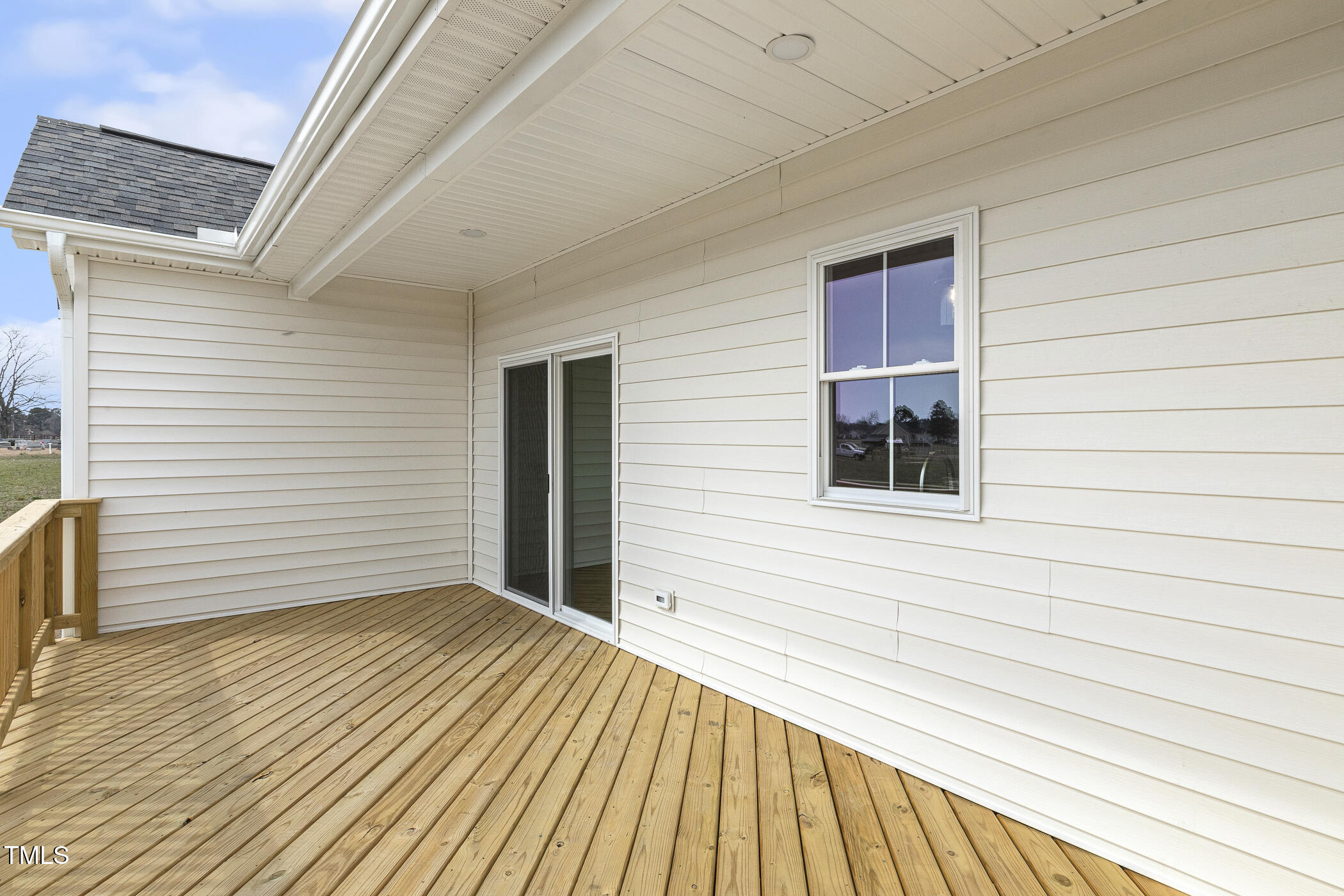 233 Surles Road Benson, NC 27504 - Photo 49 of 57 a view of a house with wooden deck