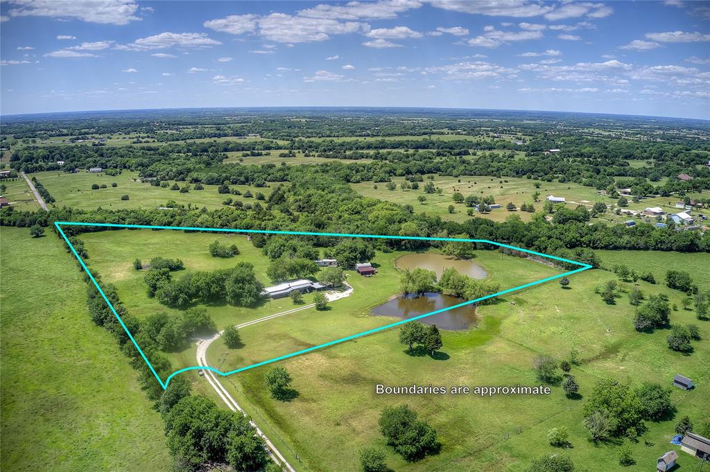 5101 Pecan Creek Road Celeste, TX 75423 - Photo 1 of 23 a view of a tennis court