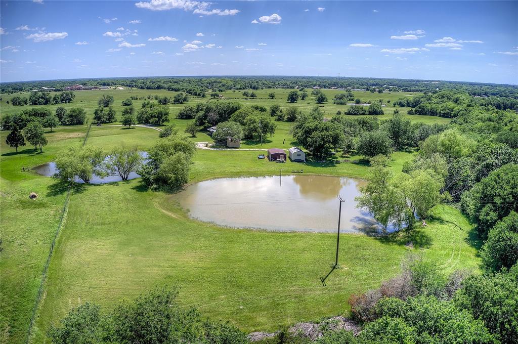 5101 Pecan Creek Road Celeste, TX 75423 - Photo 16 of 23 a view of a lake with a big yard
