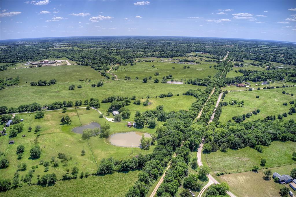 5101 Pecan Creek Road Celeste, TX 75423 - Photo 21 of 23 a view of a lush green field