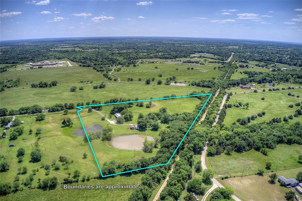 5101 Pecan Creek Road Celeste, TX 75423 - Photo 5 of 23 a view of a lush green field