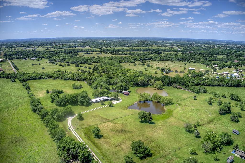 5101 Pecan Creek Road Celeste, TX 75423 - Photo 6 of 23 a view of a lake with a mountain in the background