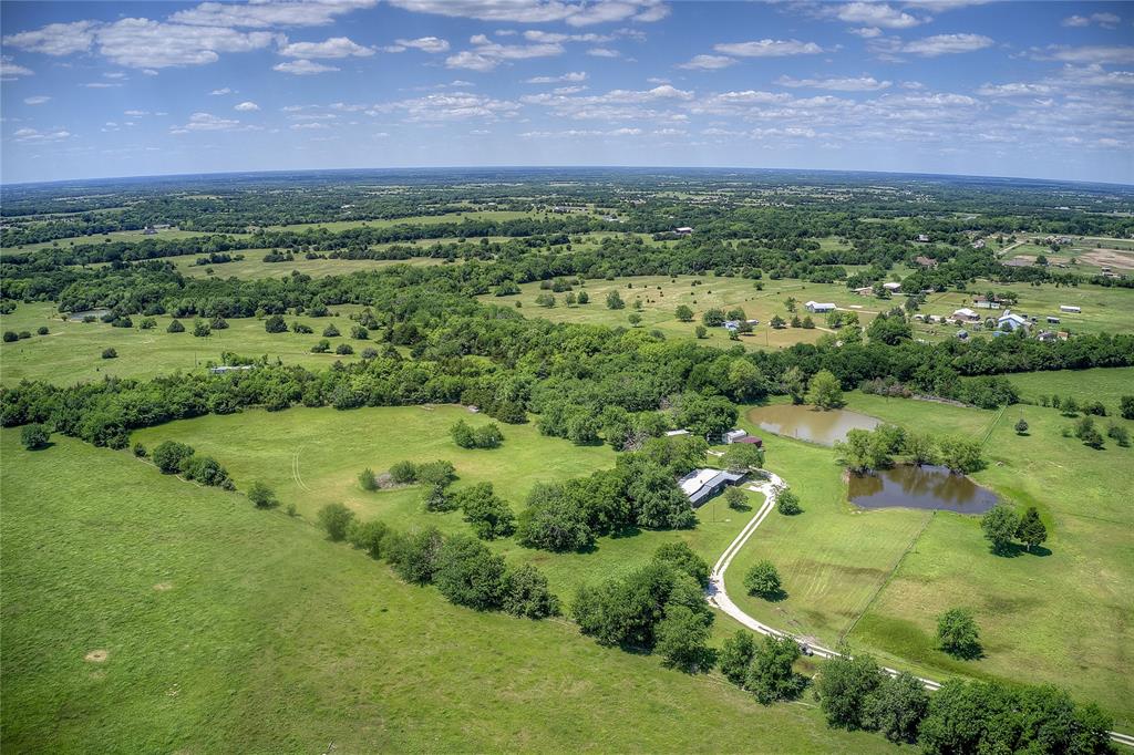 5101 Pecan Creek Road Celeste, TX 75423 - Photo 7 of 23 an aerial view of a houses with a yard
