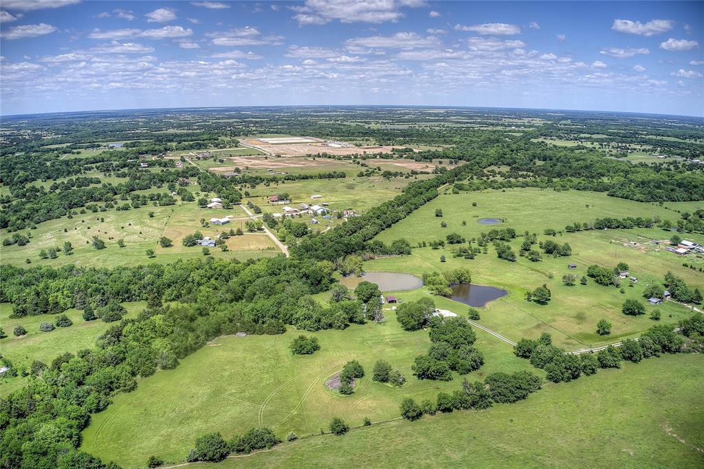 5101 Pecan Creek Road Celeste, TX 75423 - Photo 8 of 23 a view of a lush green field