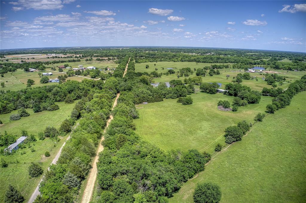5101 Pecan Creek Road Celeste, TX 75423 - Photo 10 of 23 a view of a lush green field
