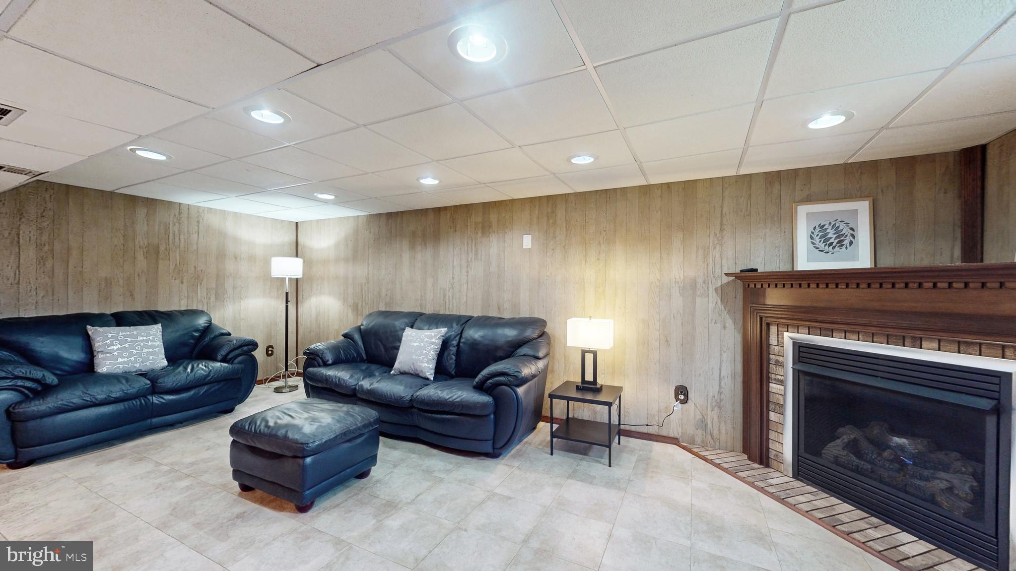 221 Tuscany Road Aston, PA 19014 - Photo 17 of 29 Walkout finished Basement with recessed lighting
