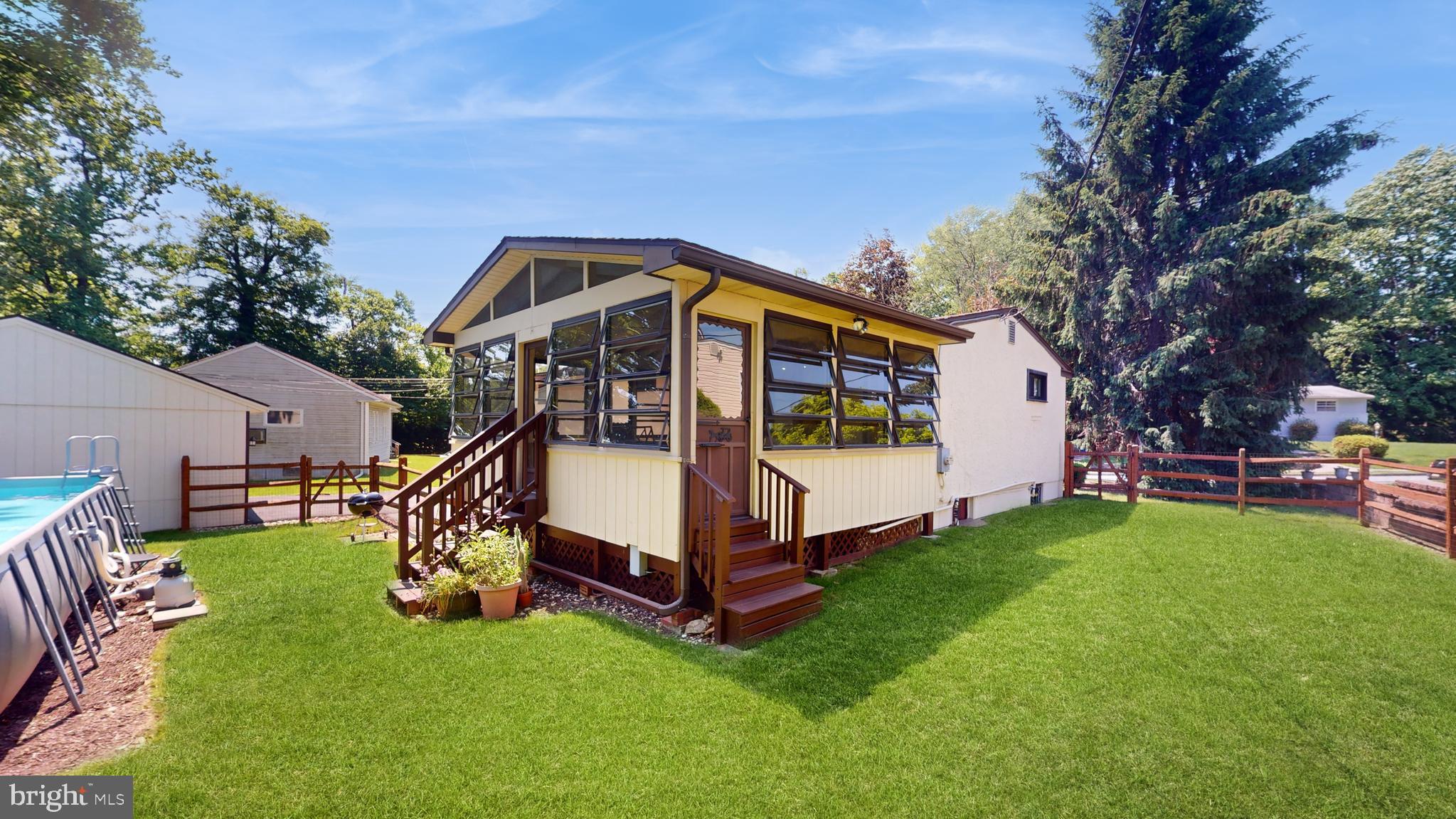 221 Tuscany Road Aston, PA 19014 - Photo 23 of 29 Exterior view of Three Season Sunroom