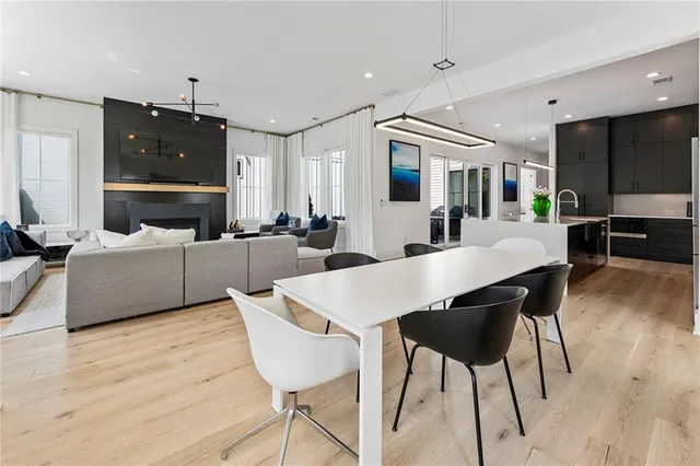 a kitchen with stainless steel appliances a refrigerator stove microwave and sink