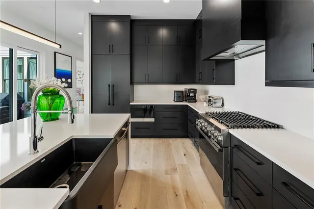 a view of a living room and a flat screen tv