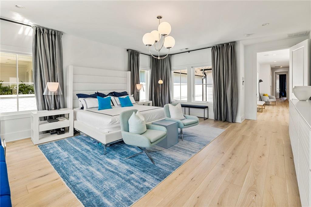 6715 Halcyon Way Alpharetta, GA 30005 - Photo 25 of 60 a living room with furniture and a chandelier