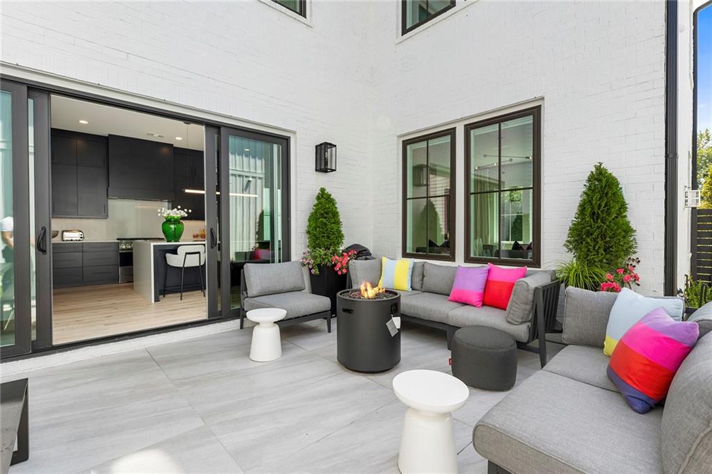 6715 Halcyon Way Alpharetta, GA 30005 - Photo 46 of 60 a living room with furniture and a large window