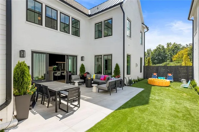 an outdoor space with lots of flower plants
