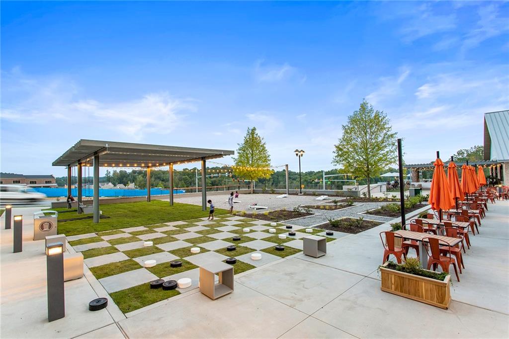 6715 Halcyon Way Alpharetta, GA 30005 - Photo 55 of 60 a childrens park with lots of swings and slides