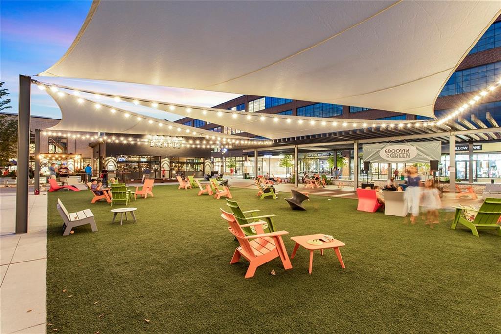 6715 Halcyon Way Alpharetta, GA 30005 - Photo 58 of 60 a group of people sitting in a yard