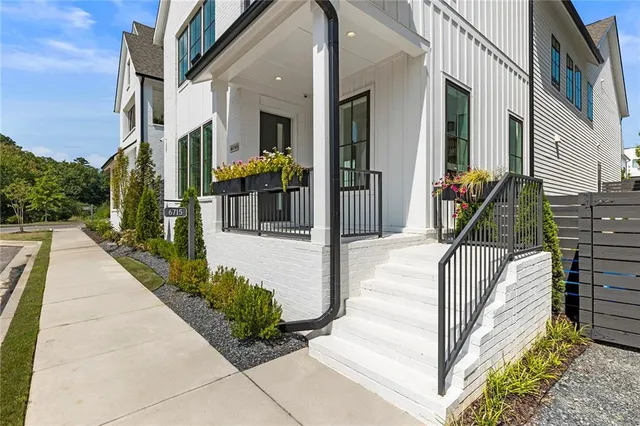 a view of a floor to ceiling window and a yard