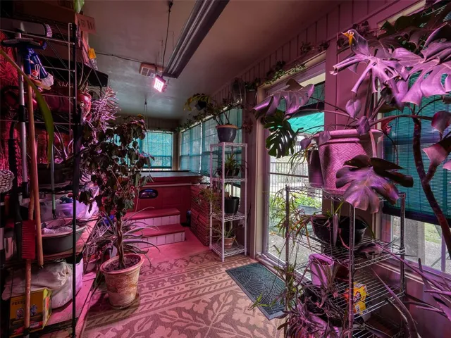 a view of a house with a yard porch and sitting area