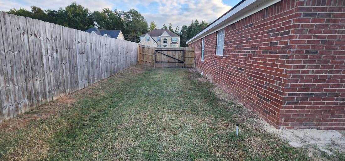 3217 Hampton Circle Augusta, GA 30906 - Photo 35 of 36 3217HamptonCirBackYardGate