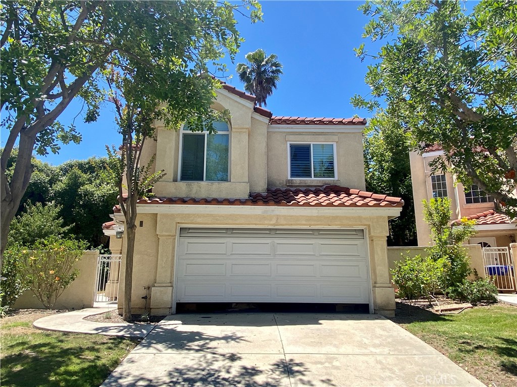 a view of house with yard