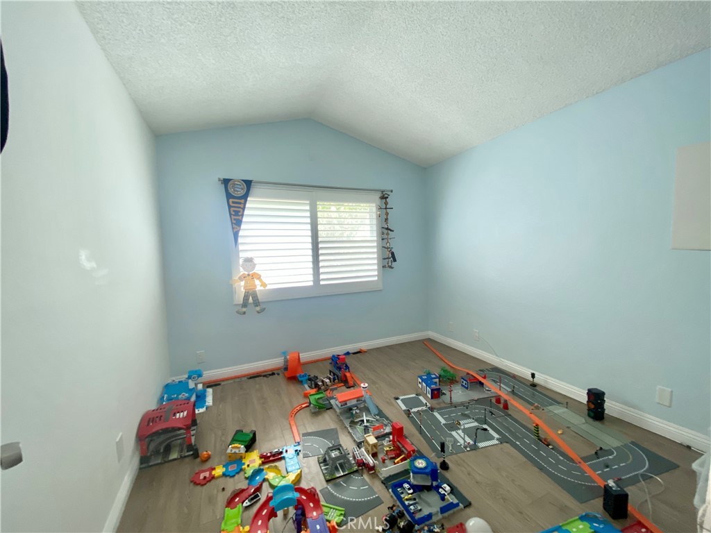 3 Cll Del Rey Phillips Ranch, CA 91766 - Photo 12 of 25 a room with toys and wooden floor