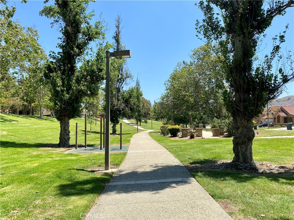 3 Cll Del Rey Phillips Ranch, CA 91766 - Photo 23 of 25 a view of a house with a yard