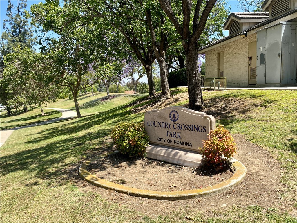 3 Cll Del Rey Phillips Ranch, CA 91766 - Photo 25 of 25 a backyard of a house with a fountain and large tree