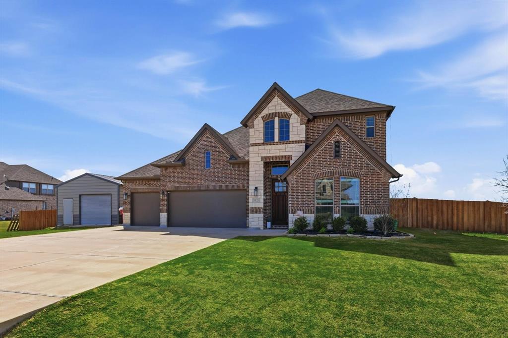 3120 Jessup Circle Blue Ridge, TX 75424 - Photo 1 of 35 a front view of a house with a yard and garage