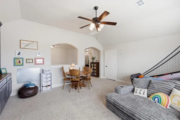 a bedroom with furniture and windows