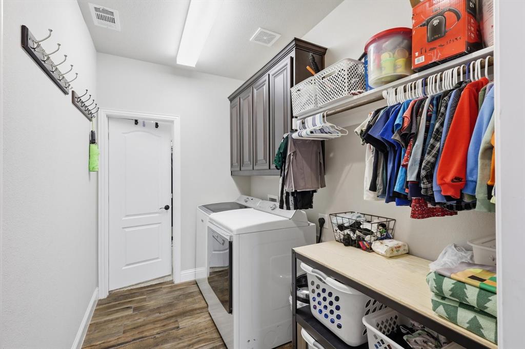 3120 Jessup Circle Blue Ridge, TX 75424 - Photo 33 of 35 a view of walk in closet with clothes and shoes