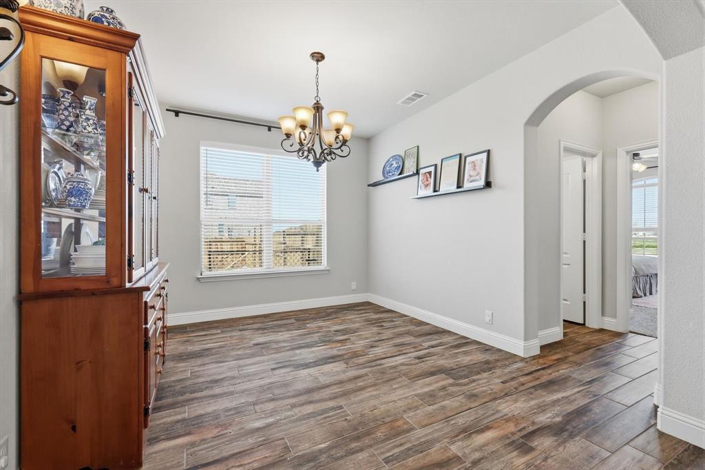 3120 Jessup Circle Blue Ridge, TX 75424 - Photo 7 of 35 wooden floor in an empty room with a window