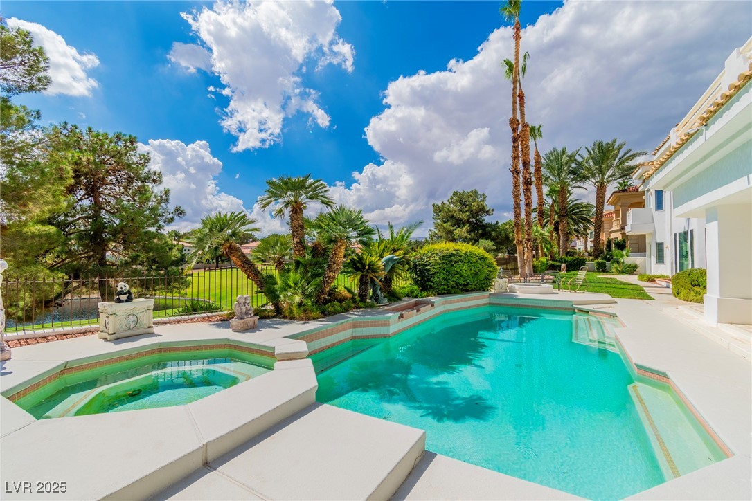 23 Cascade Creek Lane Las Vegas, NV 89113 - Photo 16 of 89 View of pool with an in-ground hot tub and a patio area