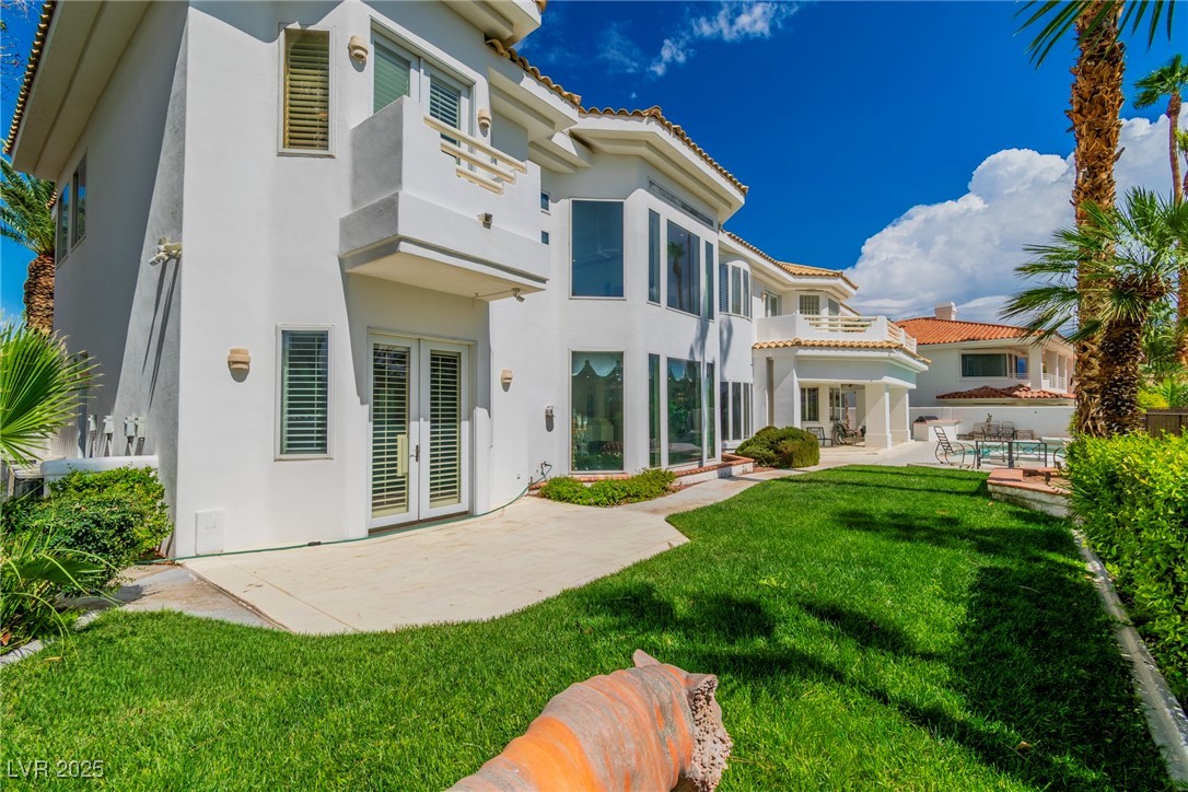23 Cascade Creek Lane Las Vegas, NV 89113 - Photo 20 of 89 Back of property with a patio, french doors, and stucco siding