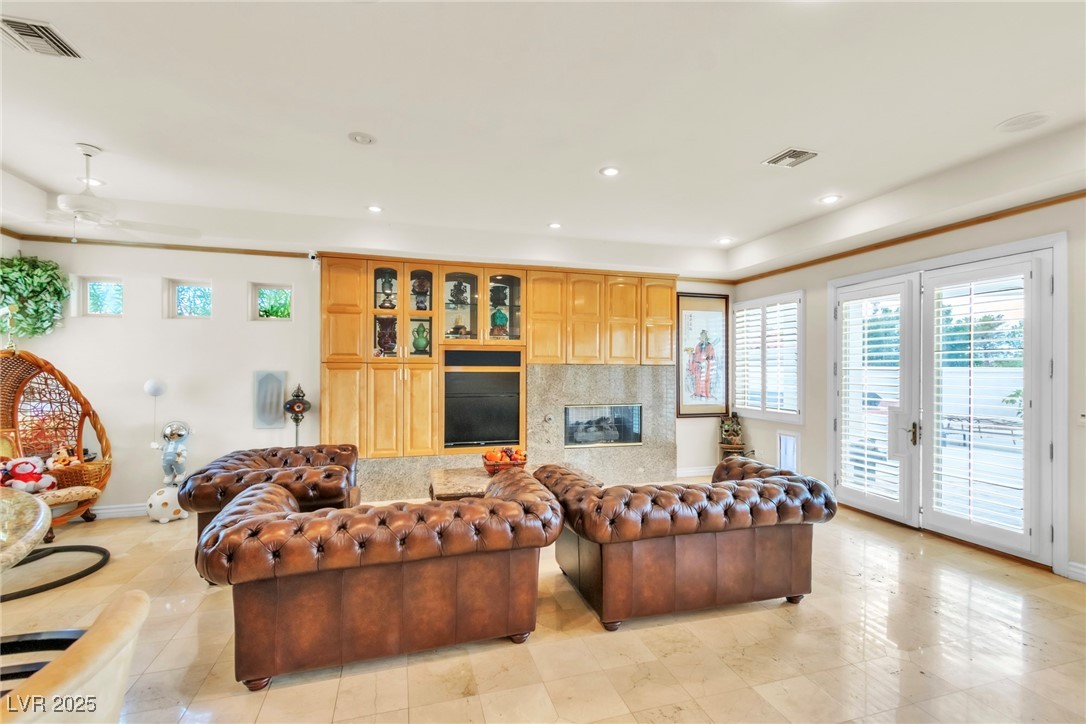 23 Cascade Creek Lane Las Vegas, NV 89113 - Photo 51 of 89 Living room with recessed lighting, french doors, and a ceiling fan