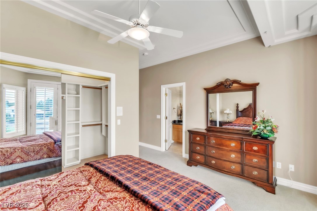 23 Cascade Creek Lane Las Vegas, NV 89113 - Photo 62 of 89 Bedroom featuring light carpet, ceiling fan, connected bathroom, and a closet