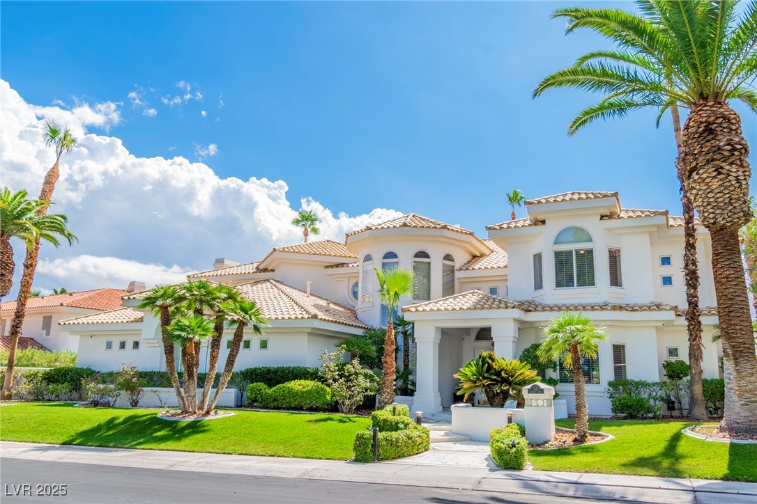 23 Cascade Creek Lane Las Vegas, NV 89113 - Photo 10 of 89 Mediterranean / spanish-style house with a front lawn and stucco siding