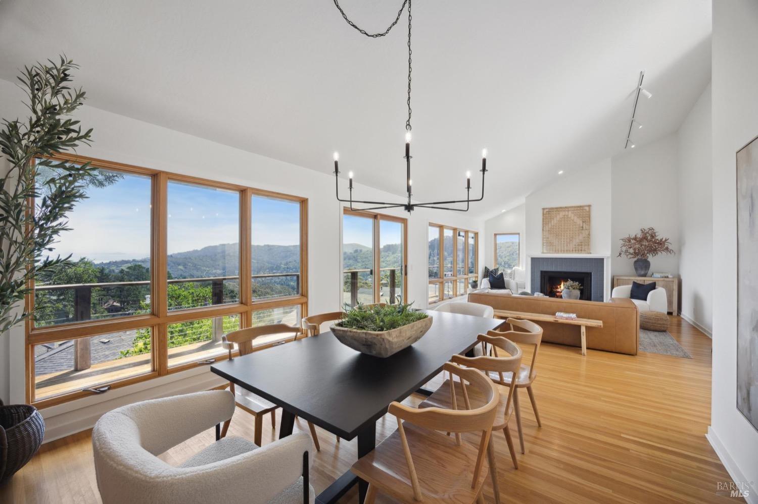 1243 Waterview Drive Mill Valley, CA 94941 - Photo 1 of 1 a living room with fireplace furniture and a large window