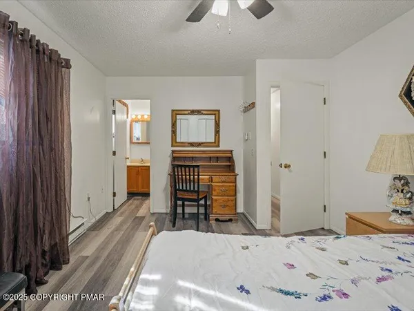 a bedroom with a bed and furniture