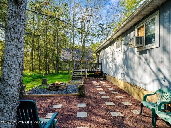 a view of a pathway with a yard