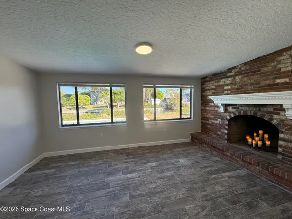 a view of a terrace with a garden