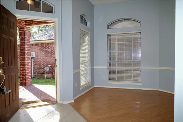 a view of empty room with windows