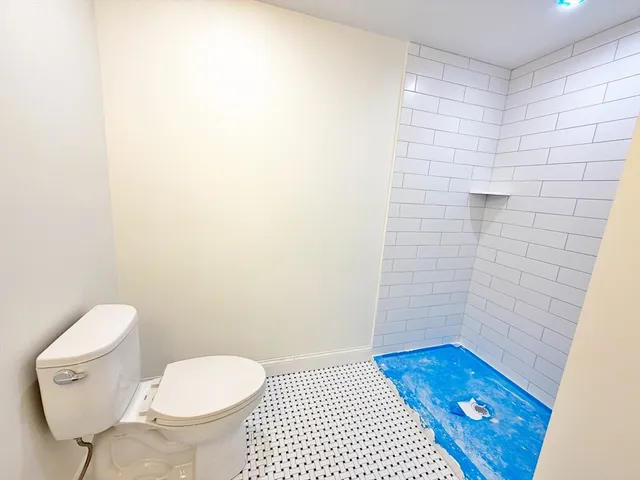 a bathroom with a toilet