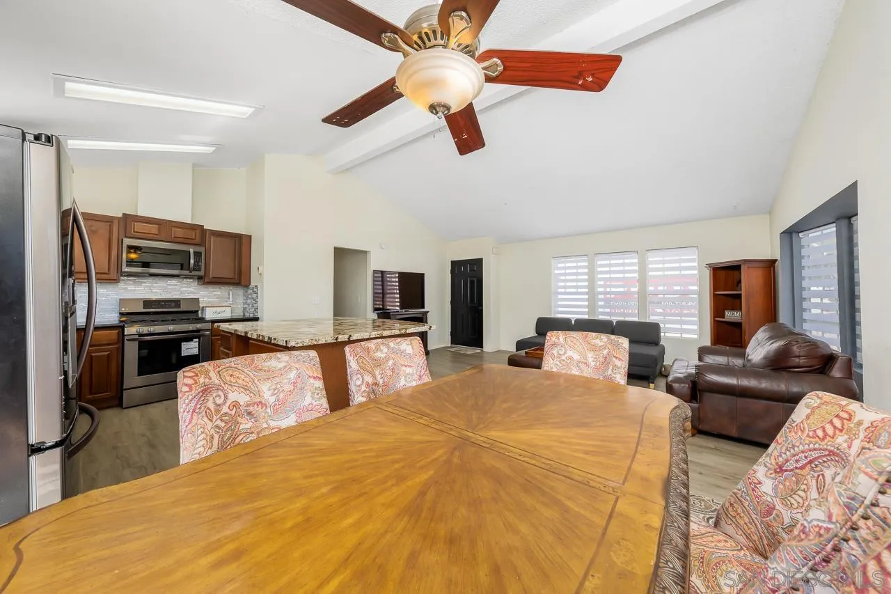 15935 Spring Oaks Road, Unit 201 El Cajon, CA 92021 - Photo 12 of 32 a large bedroom with a bed and furniture