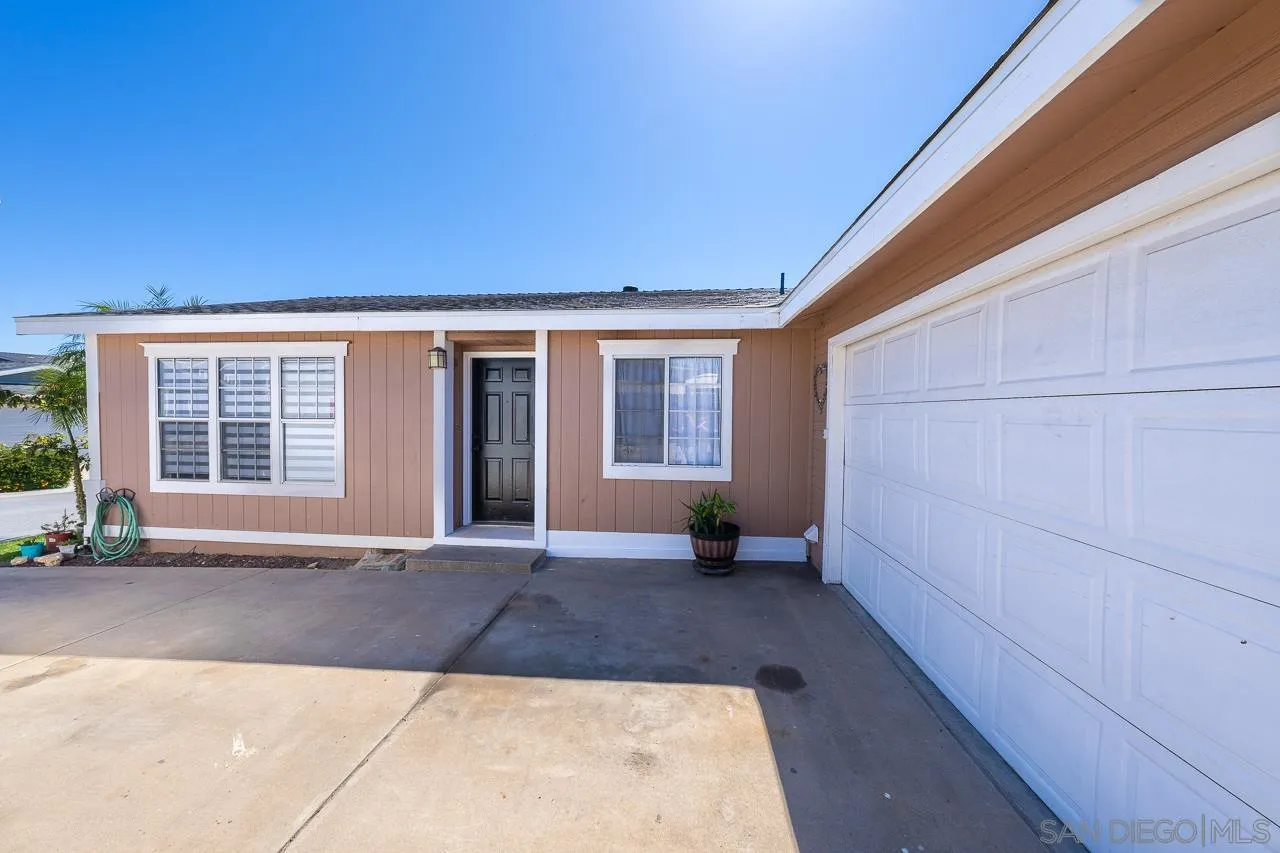 15935 Spring Oaks Road, Unit 201 El Cajon, CA 92021 - Photo 2 of 32 a view of an entrance door of the house