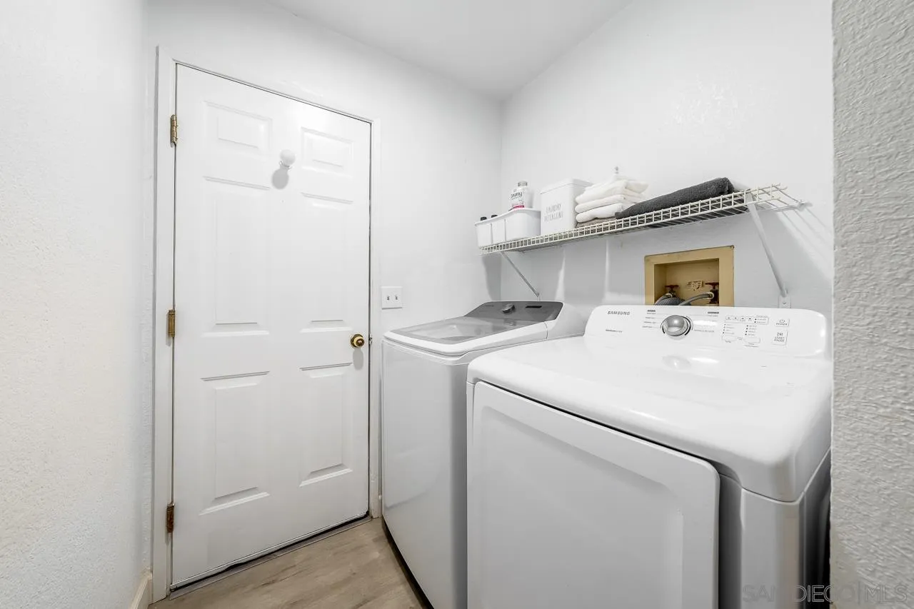 15935 Spring Oaks Road, Unit 201 El Cajon, CA 92021 - Photo 27 of 32 a utility room with dryer and washer