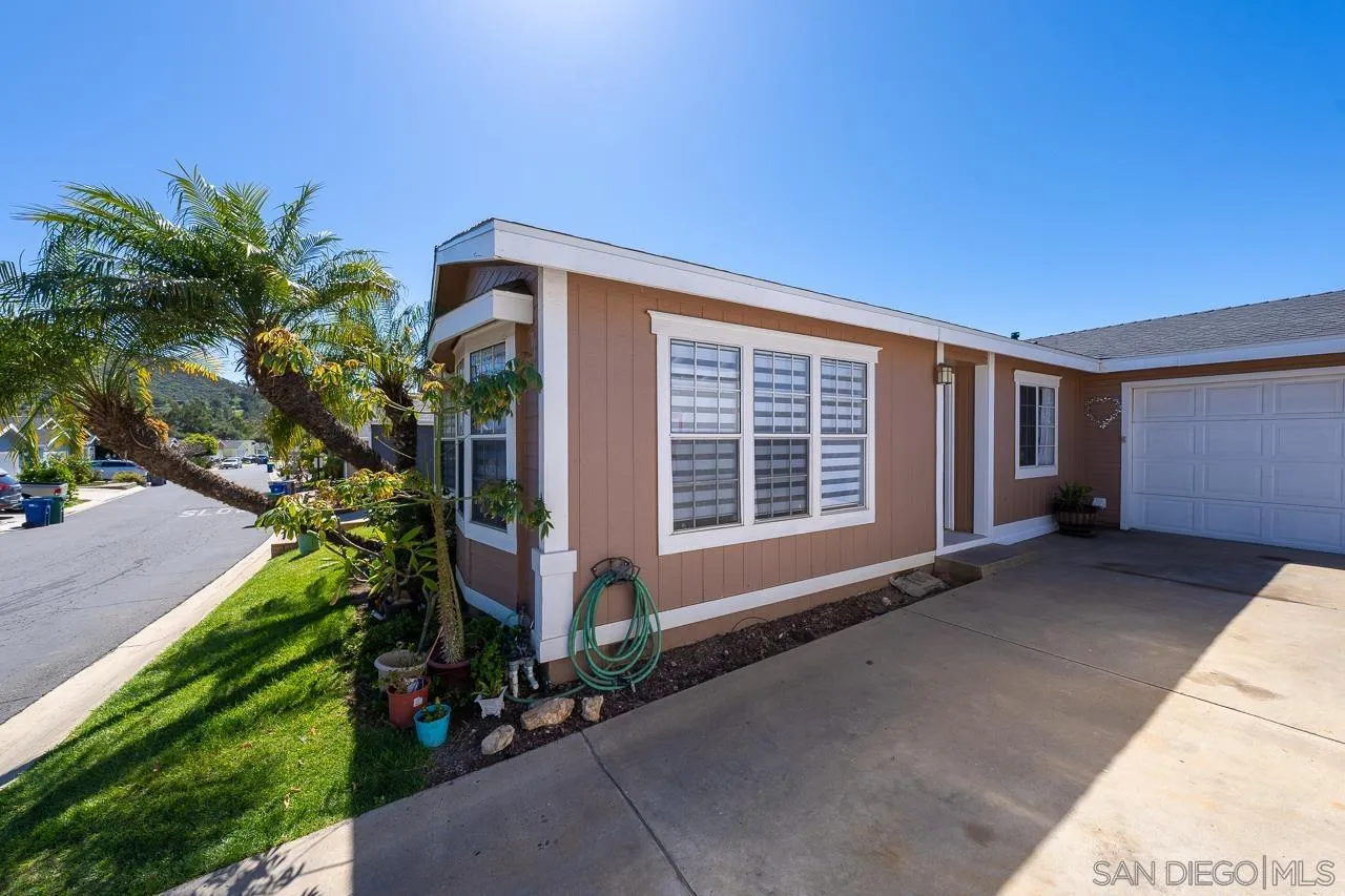 15935 Spring Oaks Road, Unit 201 El Cajon, CA 92021 - Photo 3 of 32 a front view of house with yard