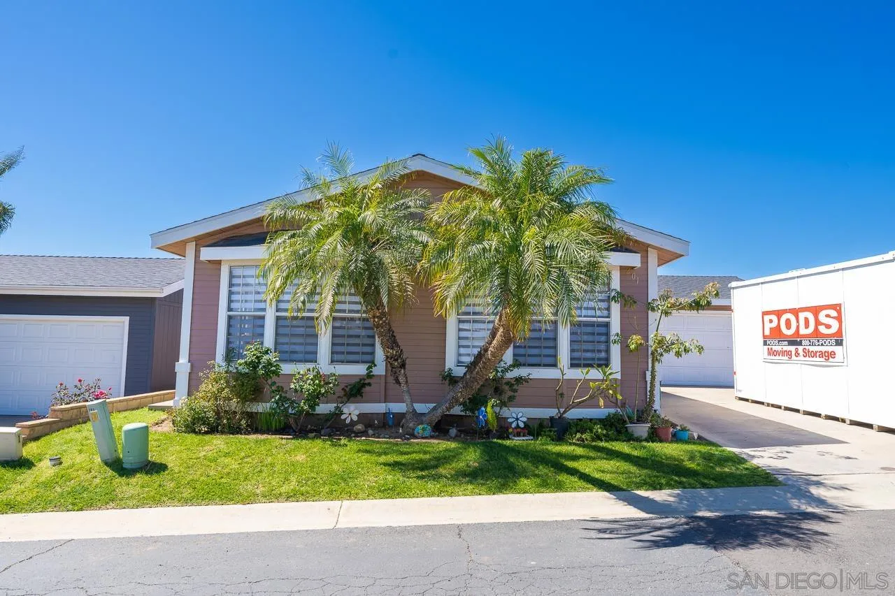 15935 Spring Oaks Road, Unit 201 El Cajon, CA 92021 - Photo 6 of 32 a front view of a house with garden