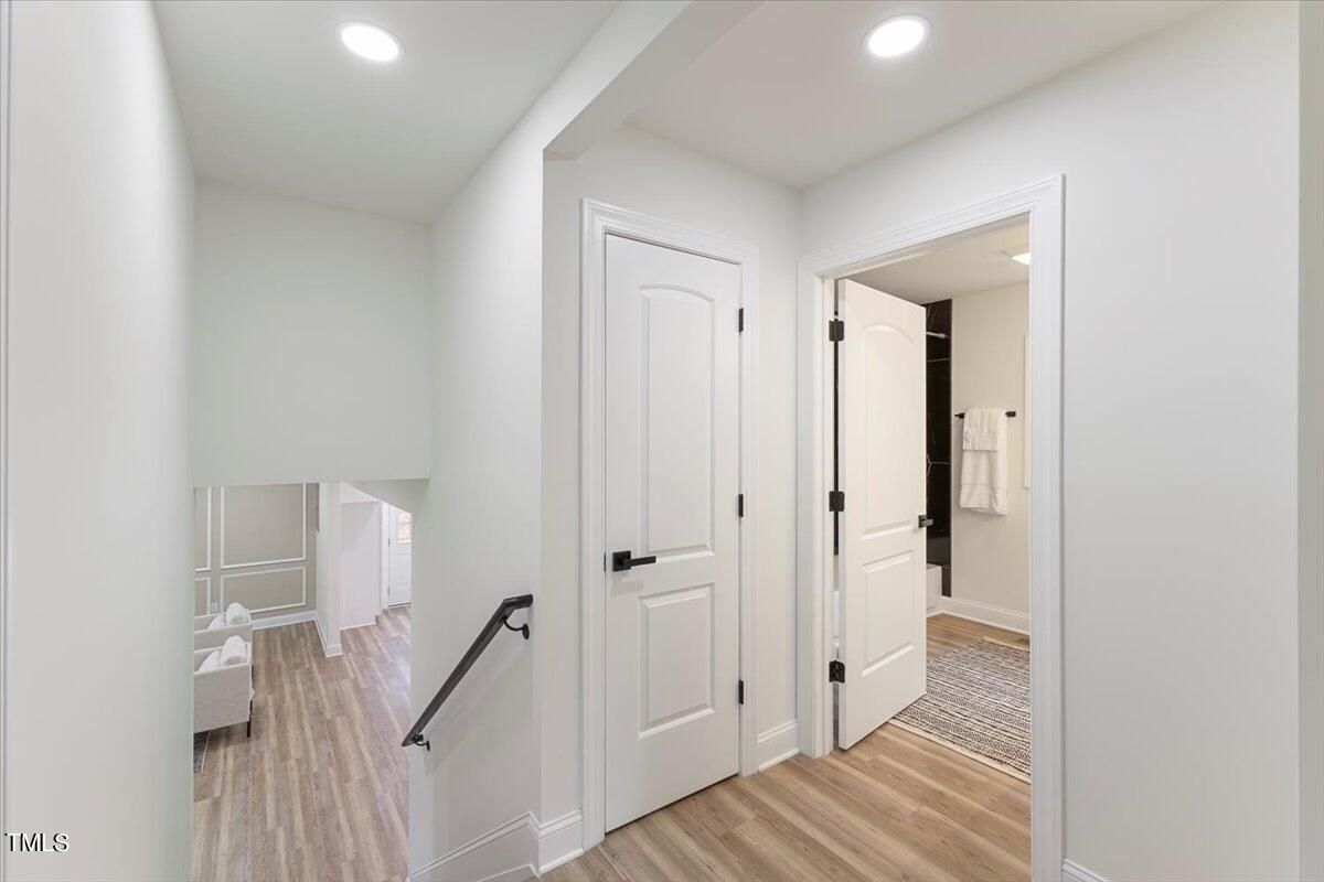 3420 Brentwood Road Raleigh, NC 27604 - Photo 40 of 53 a view of a bathroom from the hallway