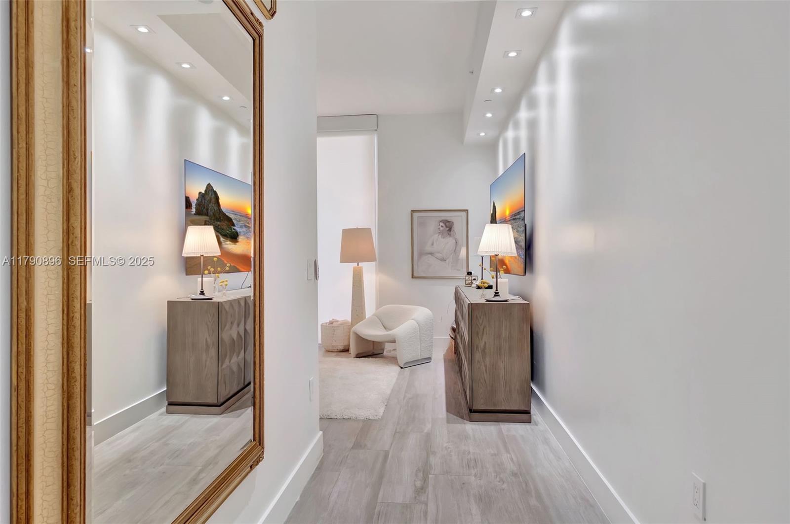 55 Southwest 9th Street, Unit PH4501 Miami, FL 33130 - Photo 16 of 71 A private hallway leads to the primary suite