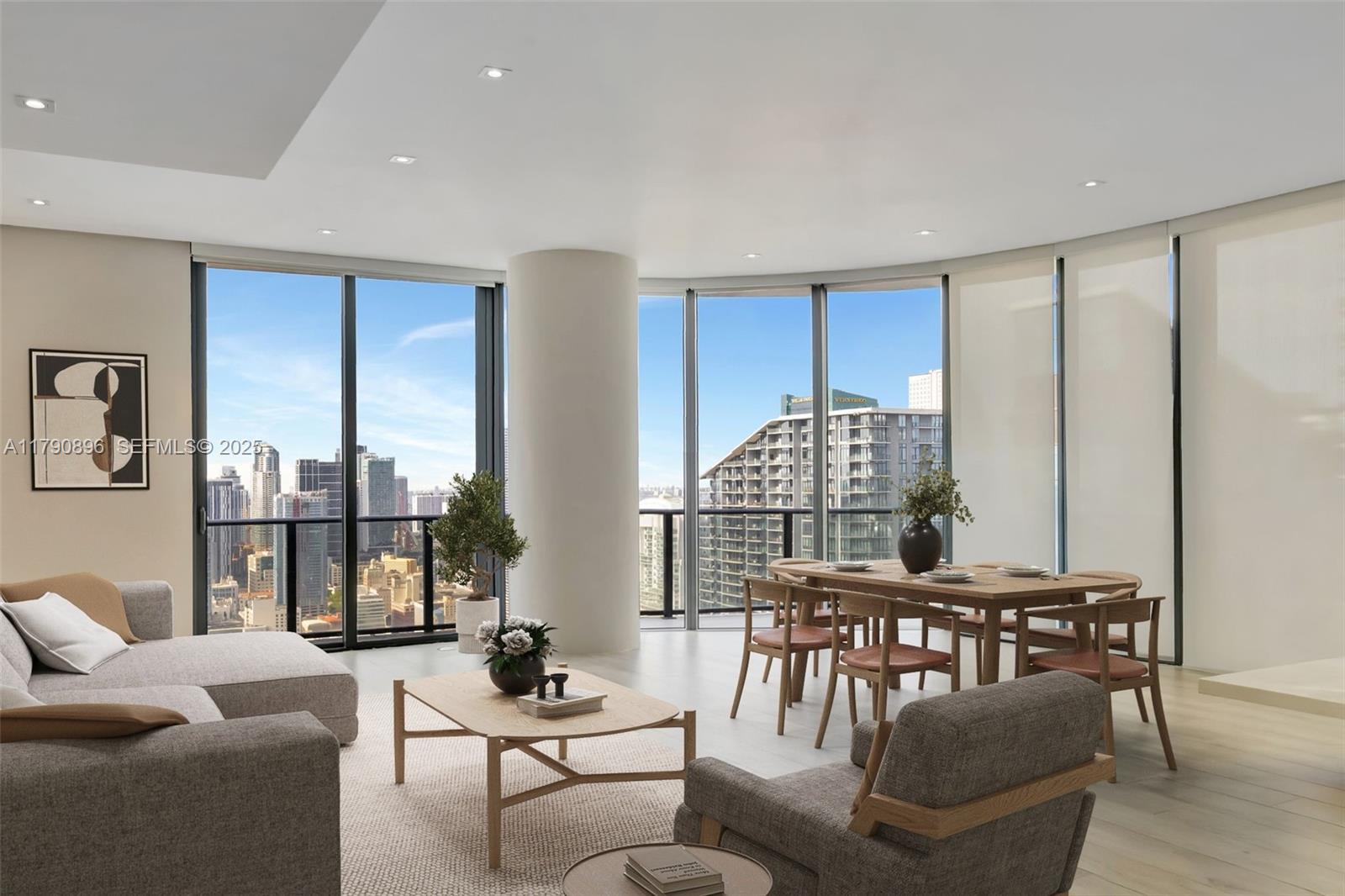 55 Southwest 9th Street, Unit PH4501 Miami, FL 33130 - Photo 2 of 71 a living room with furniture and a large window