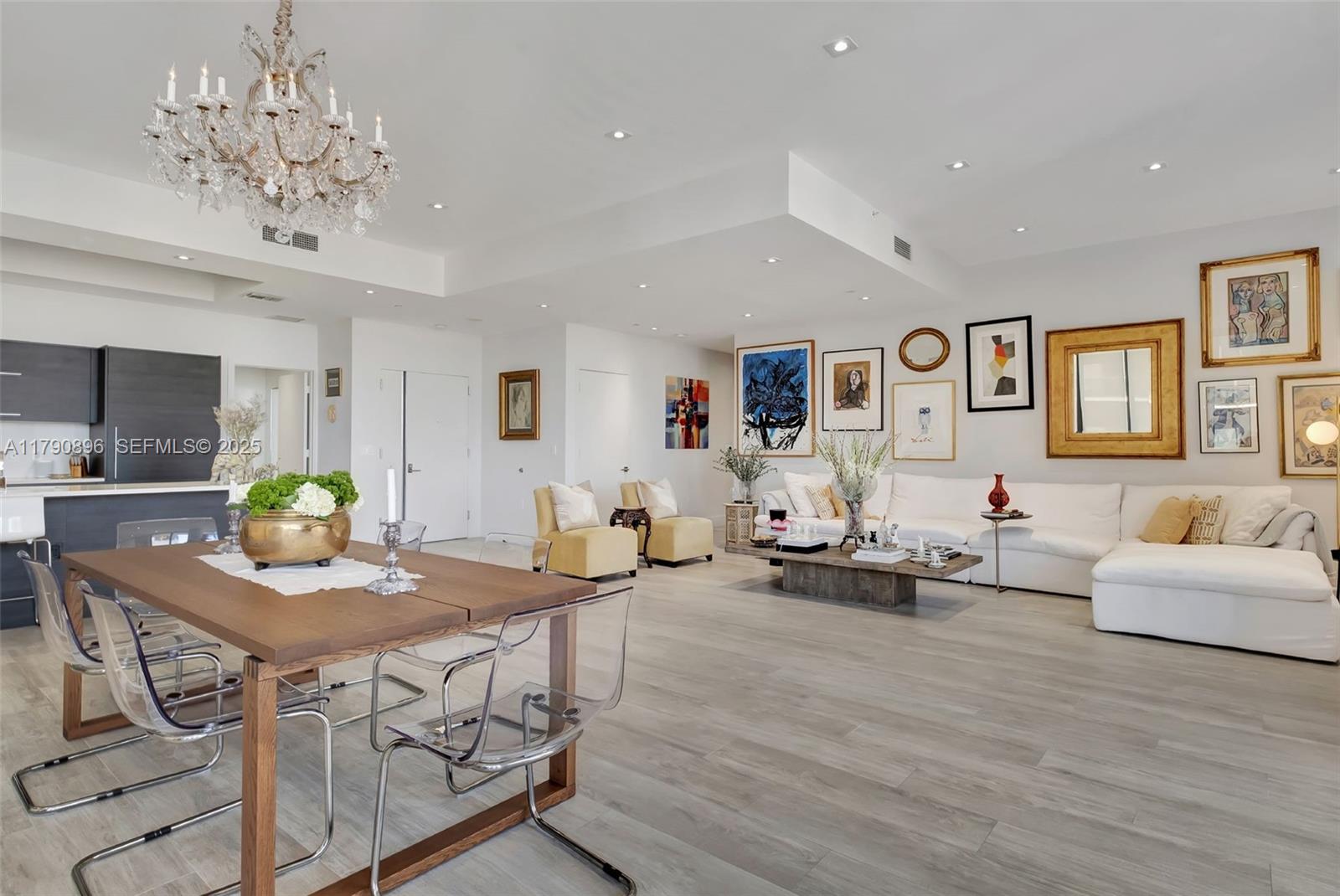 55 Southwest 9th Street, Unit PH4501 Miami, FL 33130 - Photo 5 of 71 Spacious open-concept layout combining the living and dining areas with a modern kitchen seamlessly integrated."