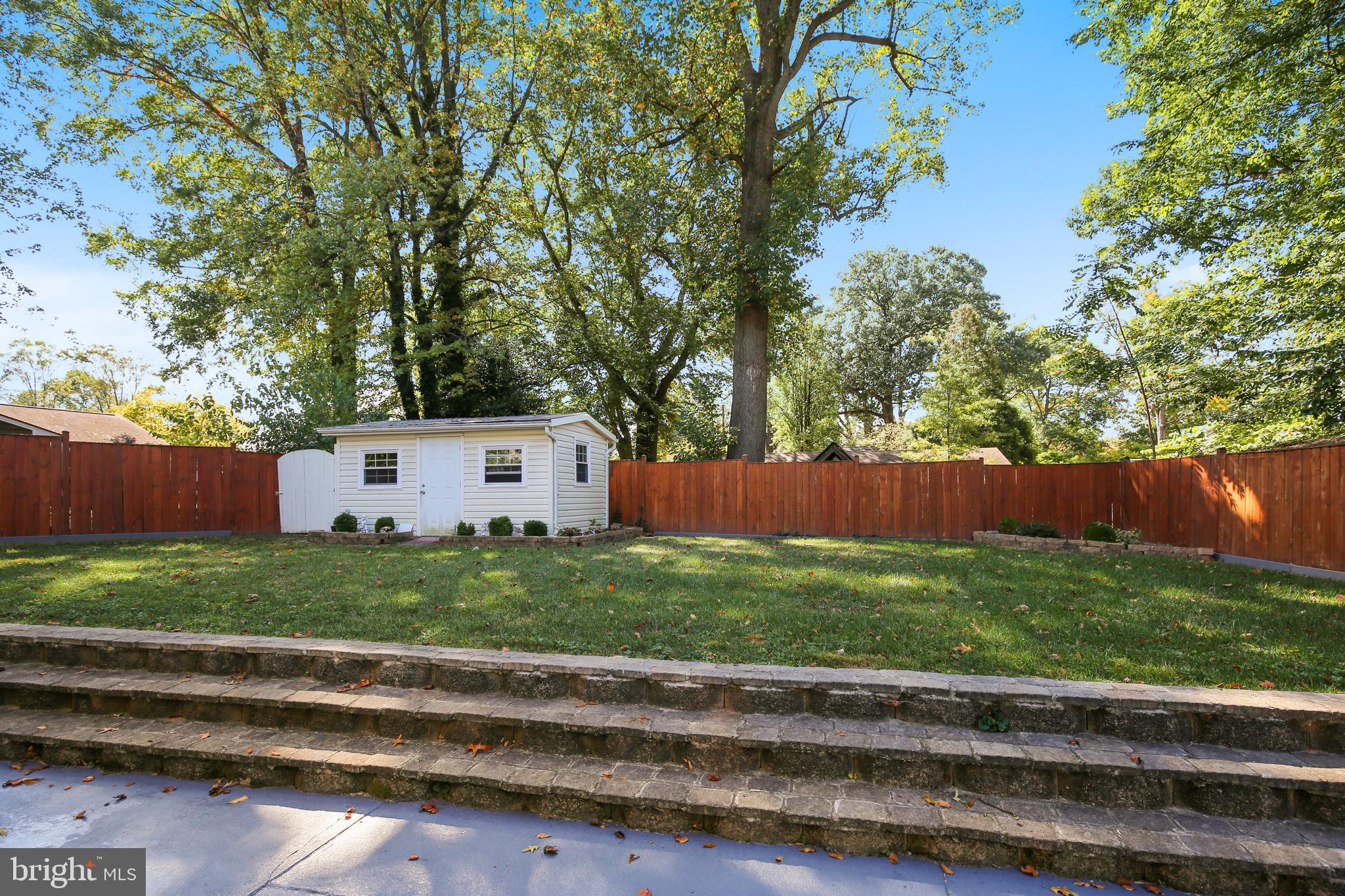 7202 Halifax Place Springfield, VA 22150 - Photo 27 of 27 Level backyard with lots of patio space and shed!